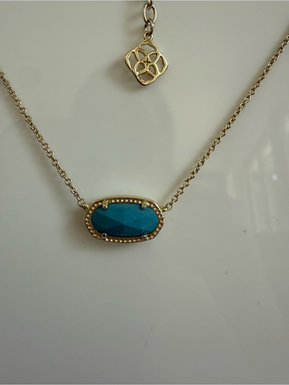 Kendra Scott Gold Necklace with Teal Blue Faceted Stone